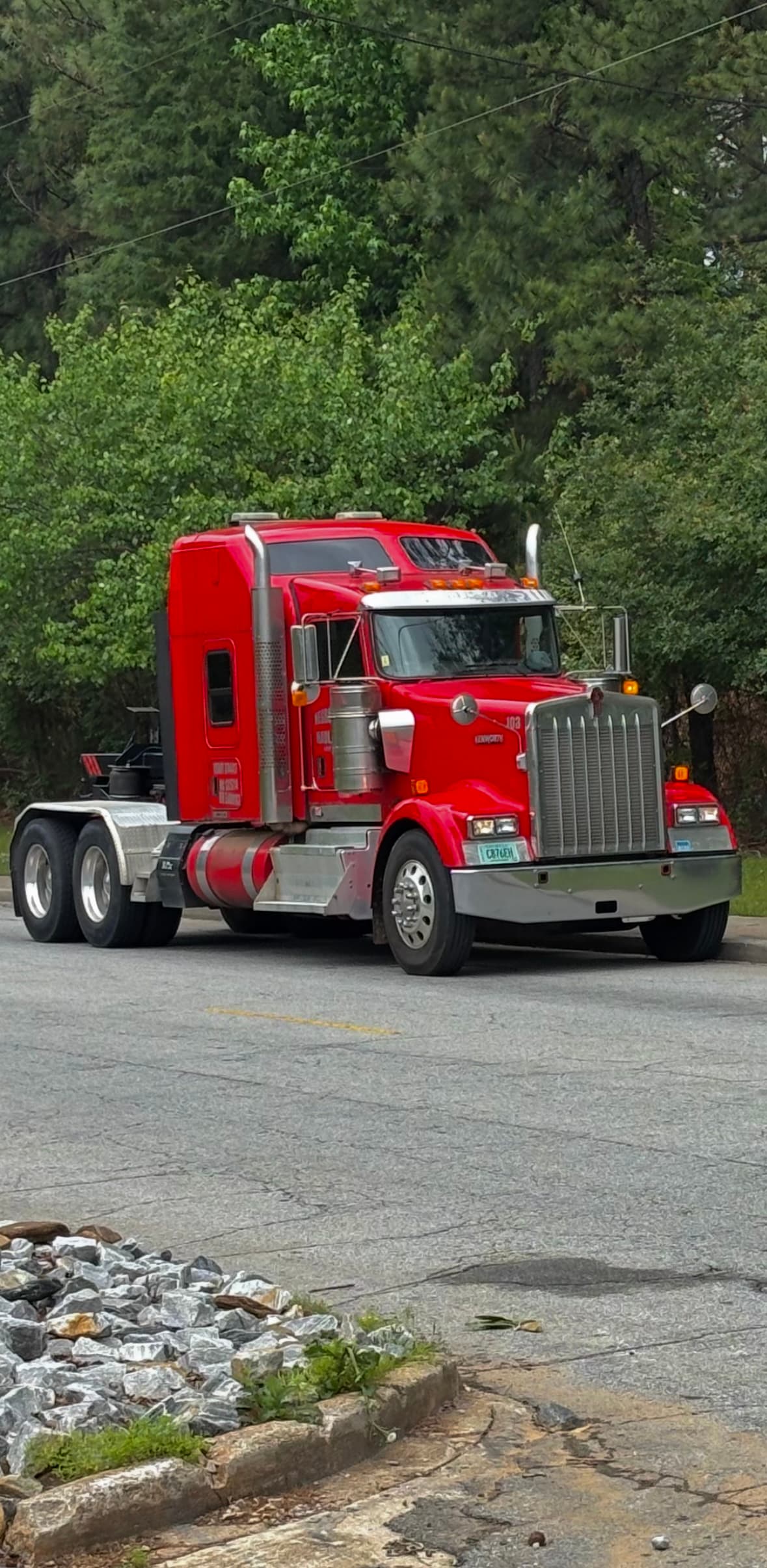 Partner's red heavy-duty tow truck used for semi-truck towing and recovery in Metro Atlanta