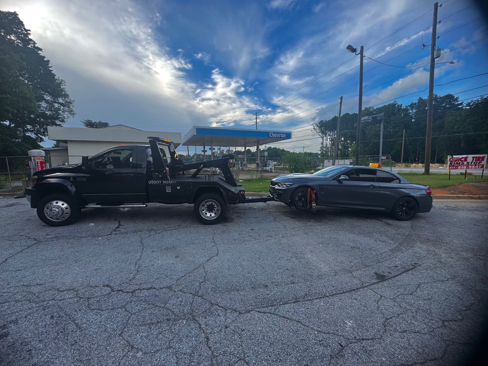Tow truck assisting broken down vehicle